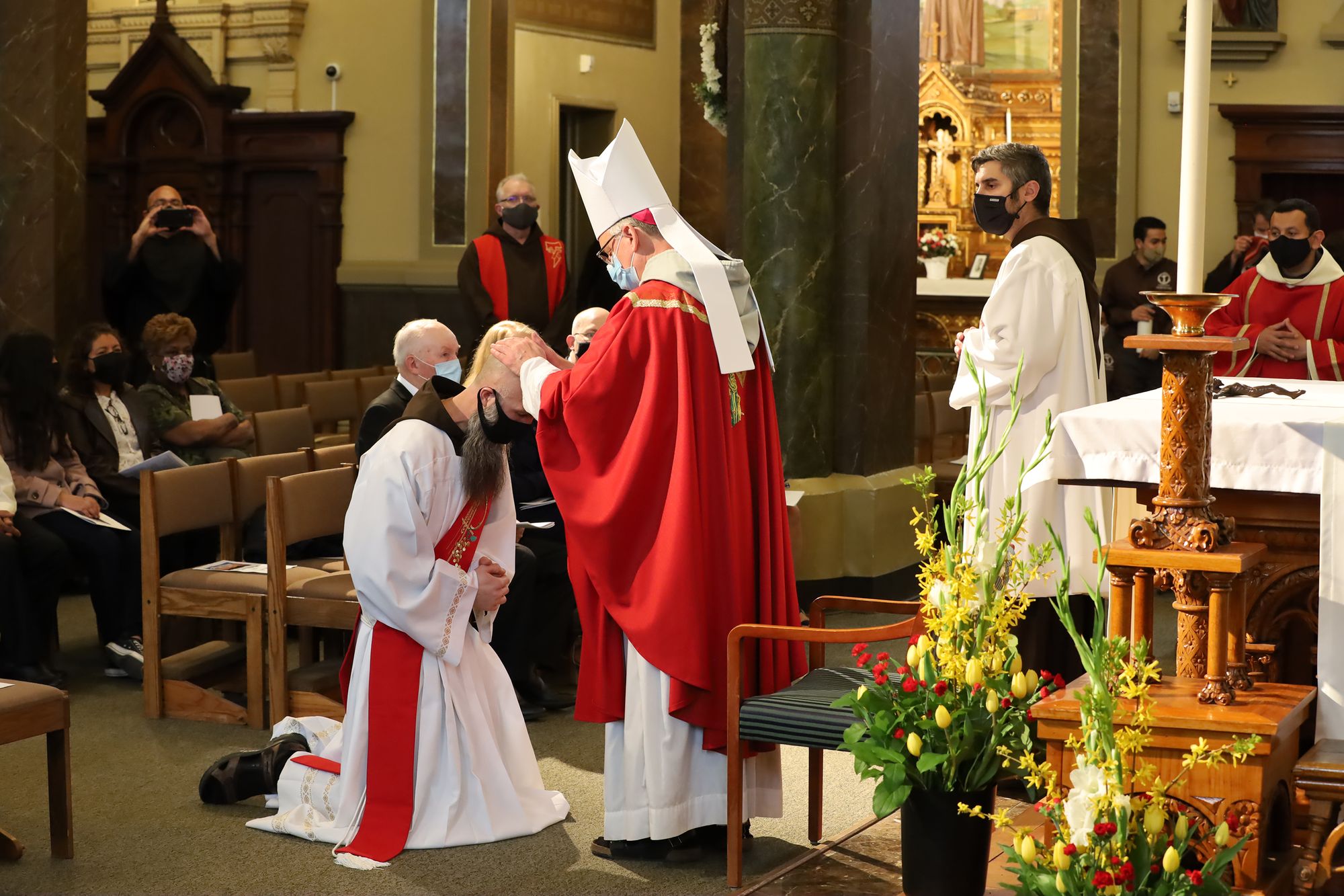 Bishop Lombardo blesses Br. Mike Dorn, OFM Capuchin at his ordination on April 24, 2021