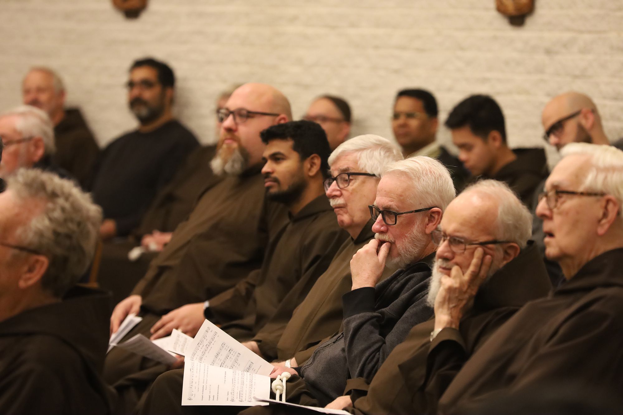 The friars listen intently during a session at the 2021 Chapter of Affairs