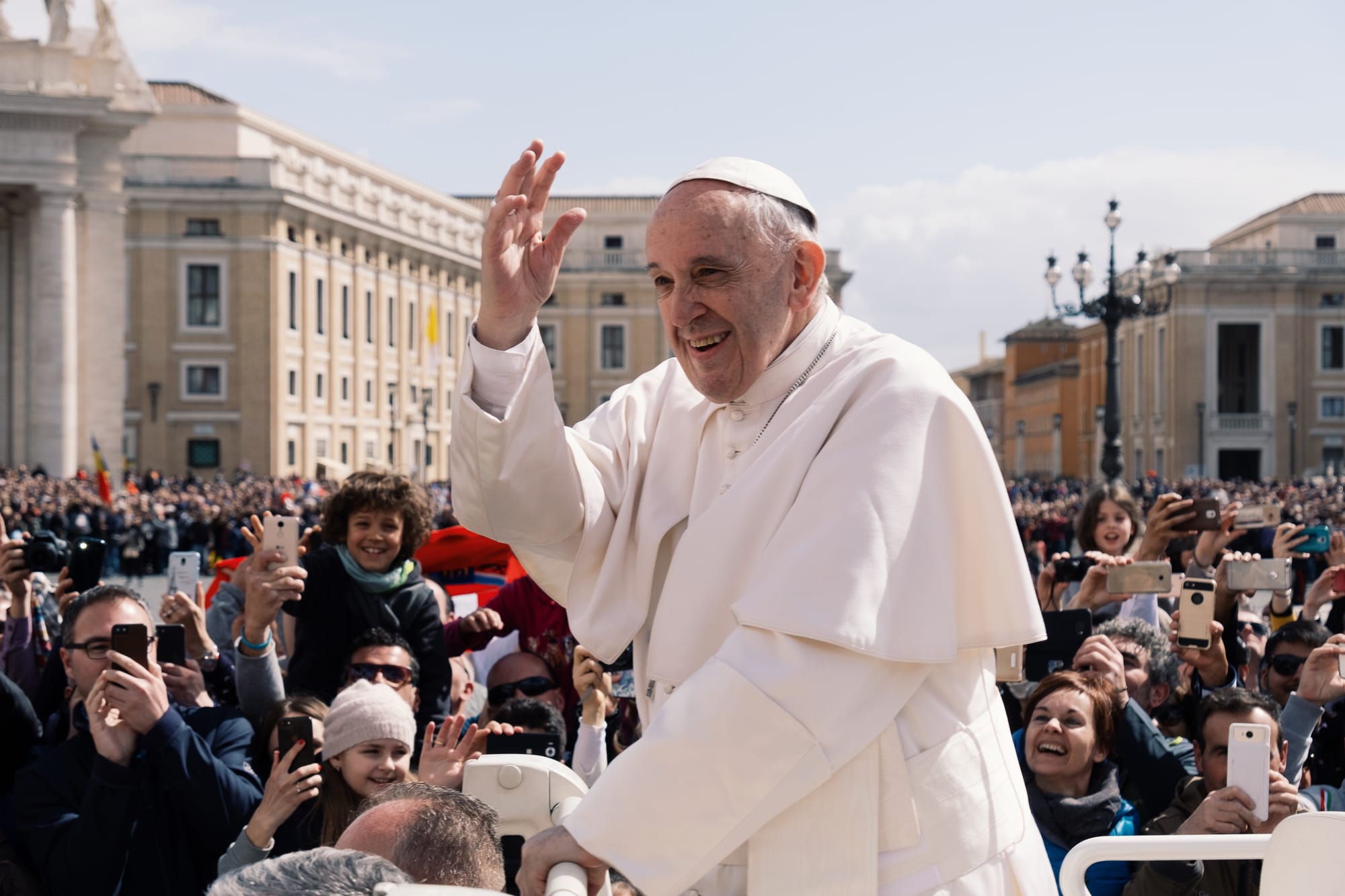 Pope Francis greets pilgrims in St. Peter's Square. 